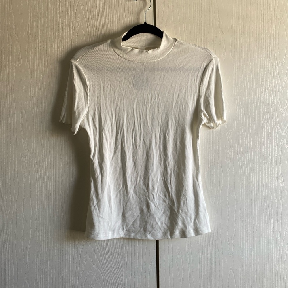 White Medium turtle neck top. Never worn with tags still on.